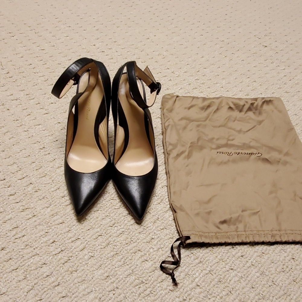 Black leather pumps